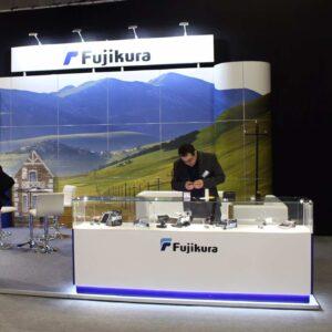 A trade show display case with products inside.