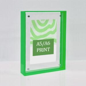 A solid green picture frame for A5/A6 prints.