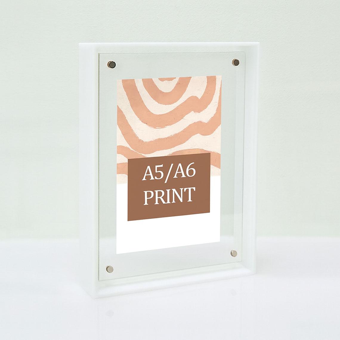 A solid white picture frame for A5/A6 prints.