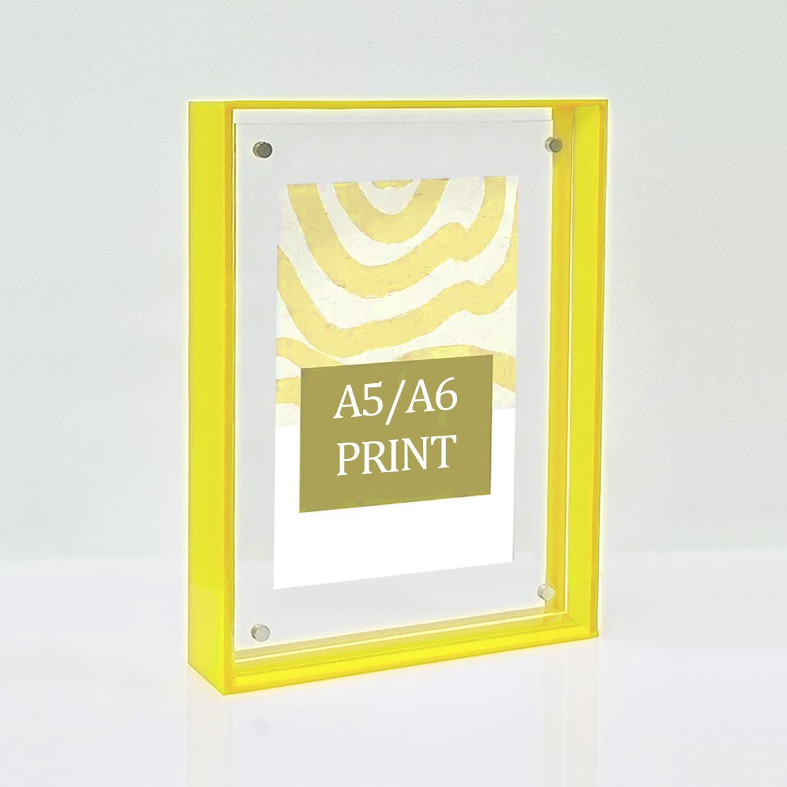 A solid yellow picture frame for A5/A6 prints.