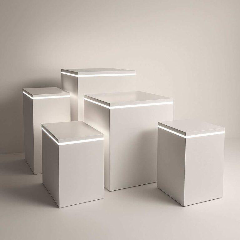 Five different sized display plinths with LED strip lights.