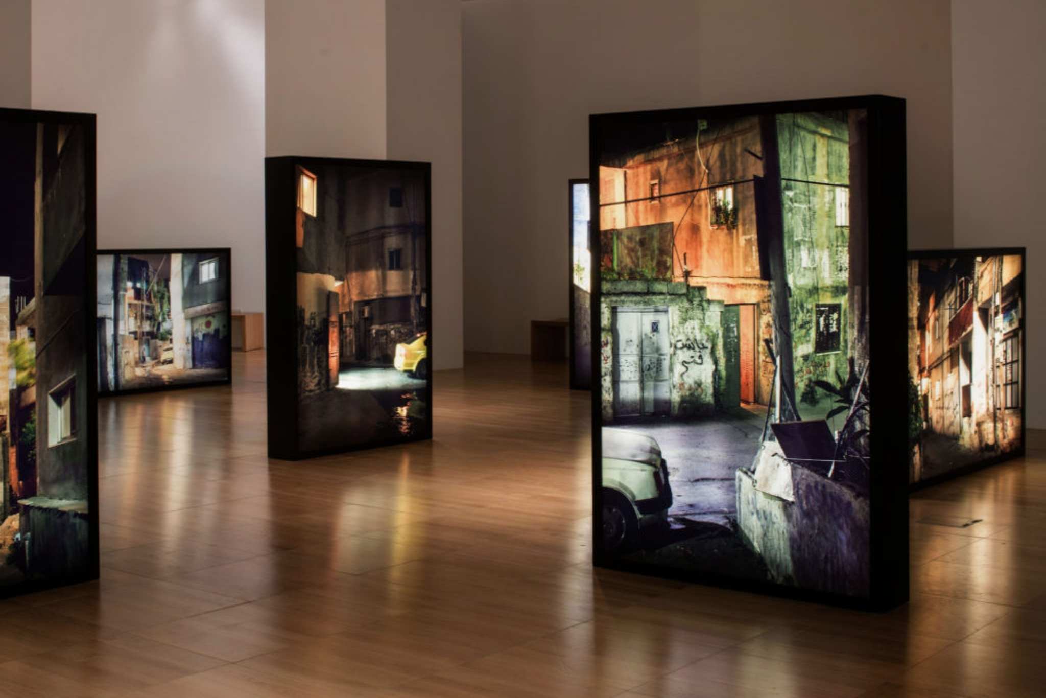 An exhibition of floorstanding lightboxes.