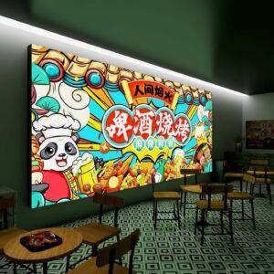 A vibrant wall mounted lightbox on a restaurant wall.