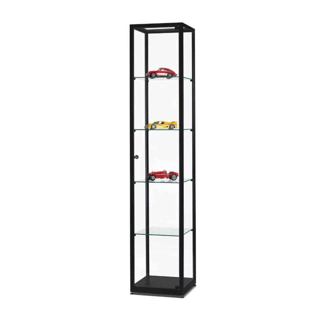 A slimline glass display cabinet with model cards on display.