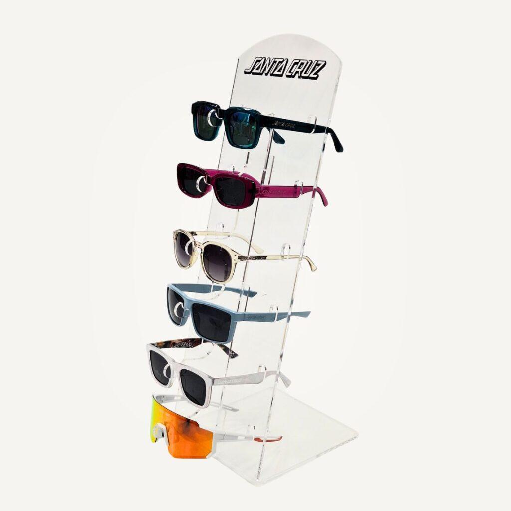 Angled view of bespoke acrylic sunglasses display stand for Santa Cruz retail POS presentation