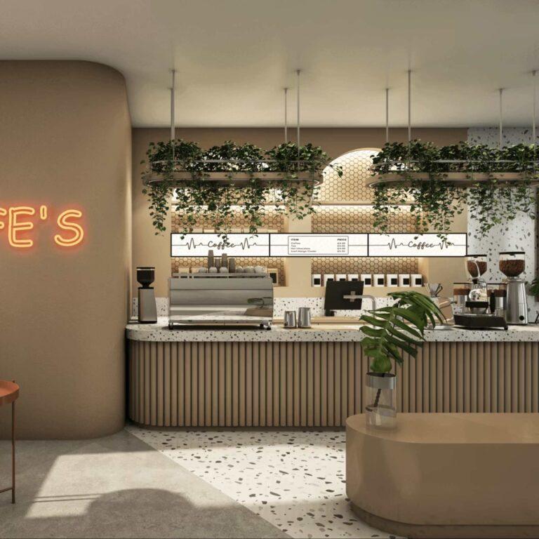 A cafe with plants and wall mounted digital screens advertising coffee.