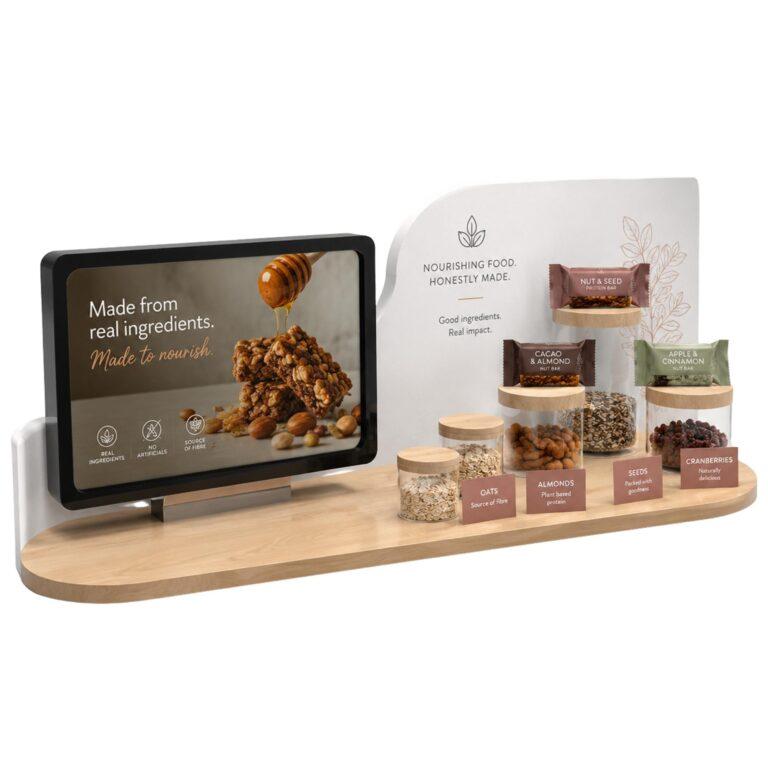 A countertop food pos display with a digital screen.