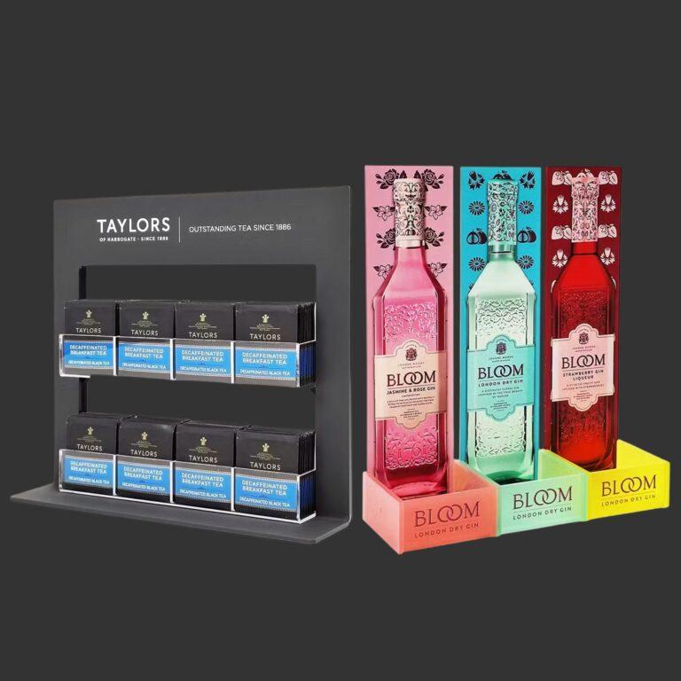 A custom countertop tea dispenser unit and a magnetic acrylic drinks bottle pos display.
