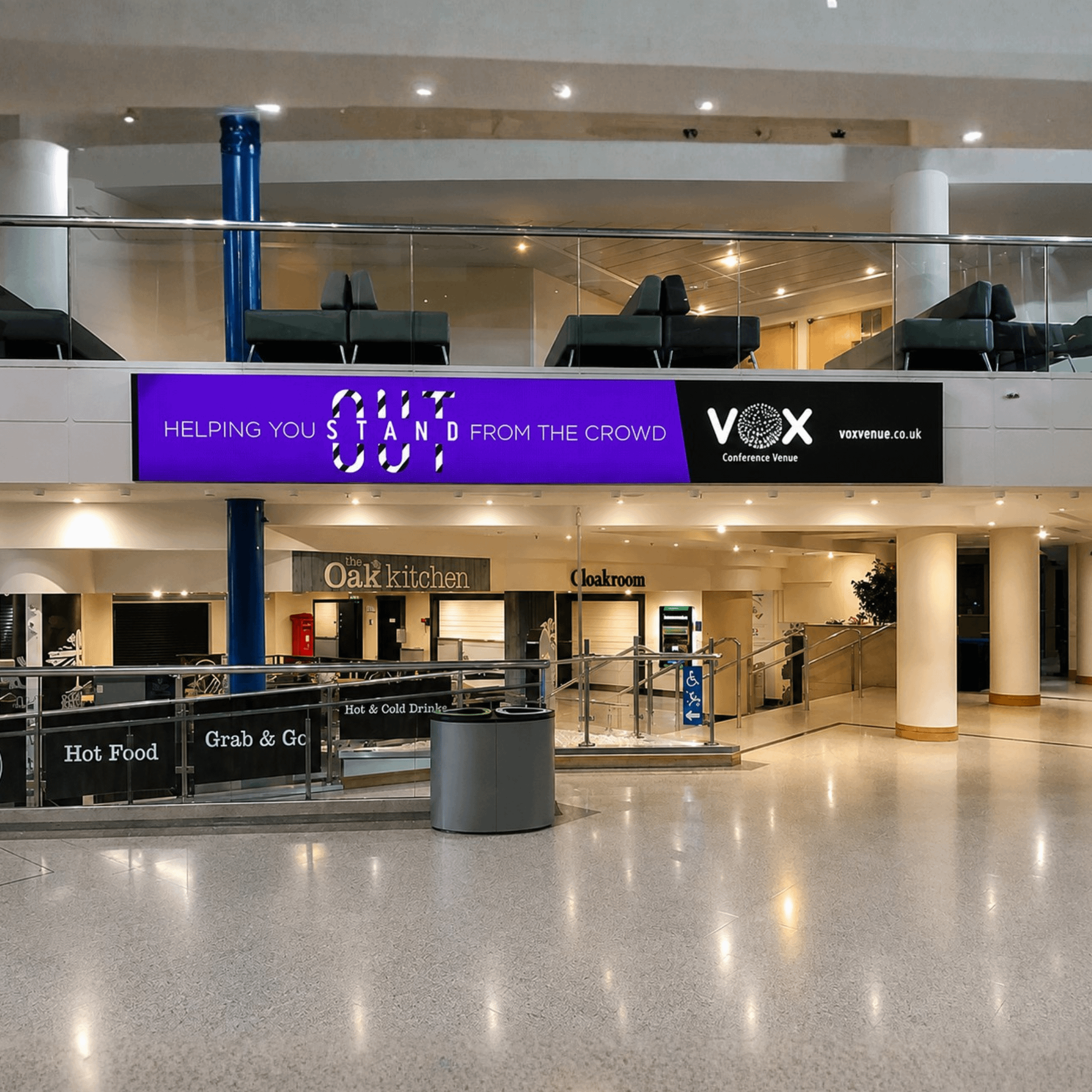 A P1.2 Indoor Direct View COB LED Screen in a modern shopping hall.