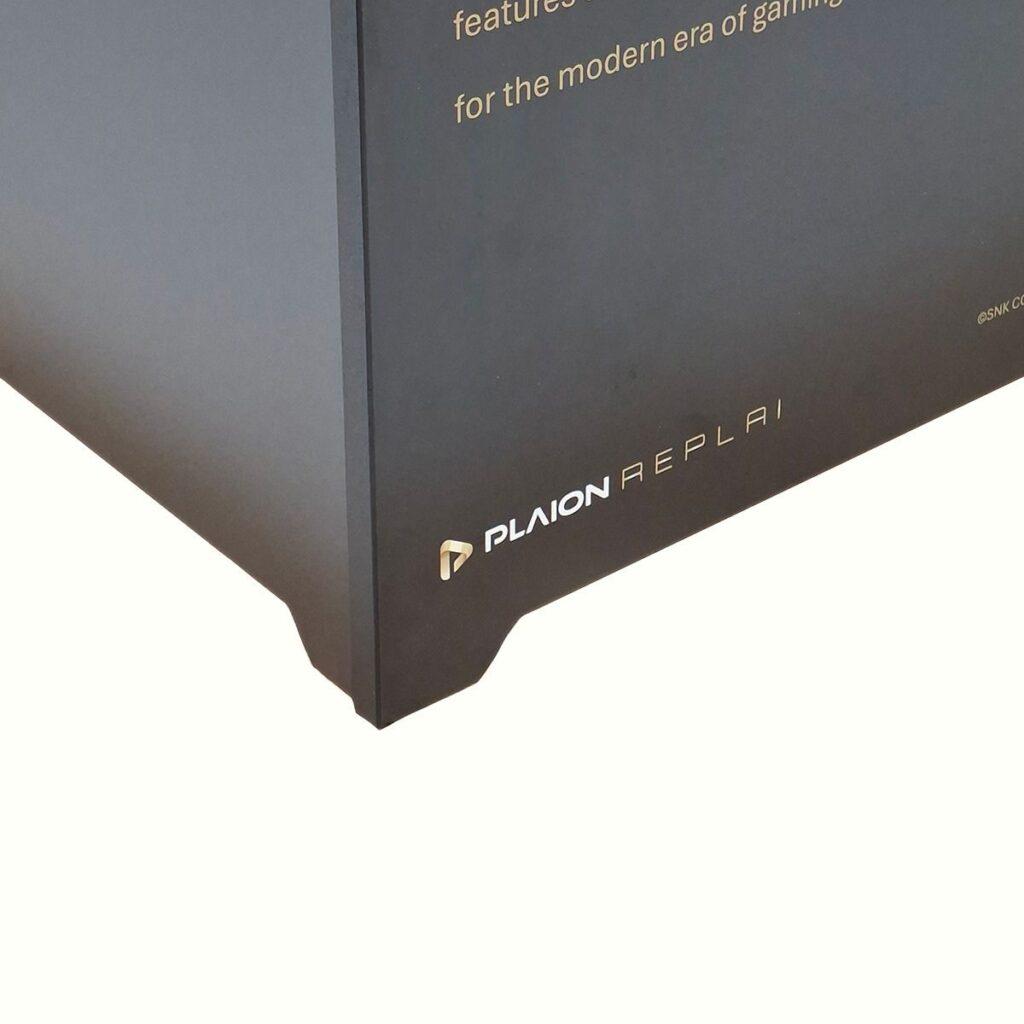 Close-up of the shaped black MDF foot detail on a bespoke NEO-GEO branded display plinth.